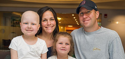 pediatric patient with her parents and sister